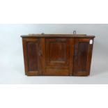 A Late 19th Century Wooden Spice Cabinet with Centre Pull Out Tea Caddy Store Over Small Drawer