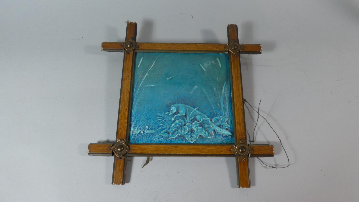 A Framed Tile Depicting Fox About to Attack Ducks in Bullrushes, 20cm Square