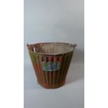 A Vintage Red Painted Ribbed Galvanised Fire Bucket by Four Oaks