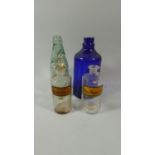 A Collection Bottles to Include Two Chemist and Two Other Glass Bottles