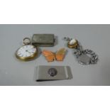 A Gold Plated Ladies Pocket Watch Together with a Novelty Book Shaped Vesta, Golding Money Clip Etc