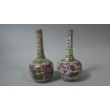 A Pair of Chinese Bottle Vases In the Famille Rose Pallet with Applied Clobbered Decoration
