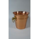 A Copper Wine Bucket with Brass Ring Handles, 20cm High