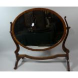 An Edwardian Mahogany Oval Swing Dressing Table Mirror, 47cm Wide