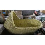 A Wicker Cradle, 74cm Long