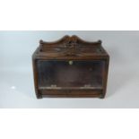 A Wooden Gallaher Glazed Counter Top Cigar Display Stand with Full Front Glaze Door and Raised