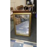 A Gilt Framed Rectangular Wall Mirror with Bevelled Glass, 89cm High