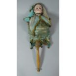 A 19th Century Musical Marotte with Porcelain Doll's Head and Turned Wooden Handle