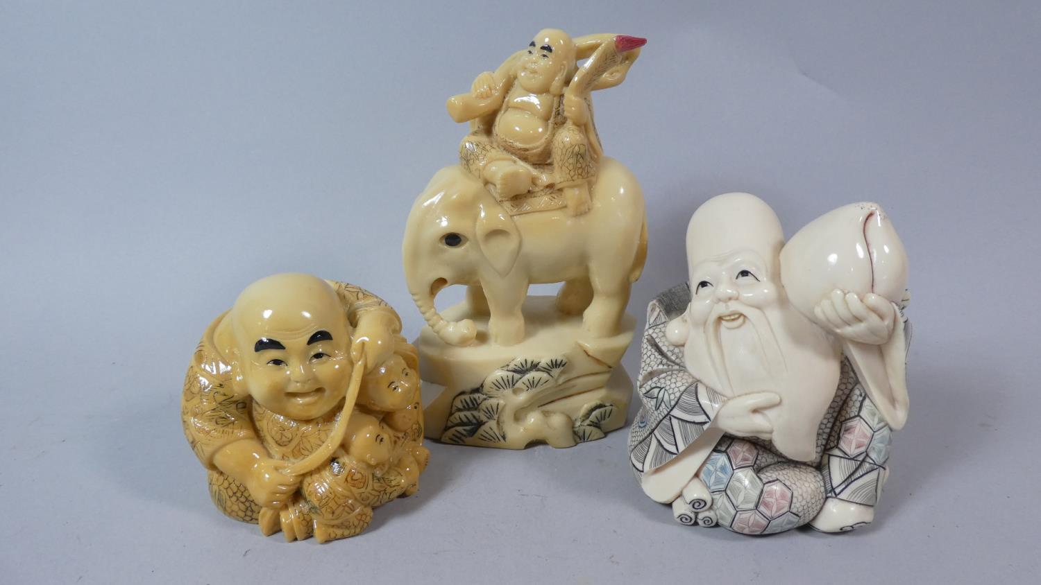 A Collection of Three Resin Studies of Oriental Elders, the Largest 16cm High