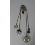 A Yellow Metal and Steel Chatelaine with Attachments to Include Jade Tiki, Painted Porcelain