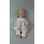 A German Porcelain Head Doll with Open Mouth and Closing Eyes, Composition Body, 55cm High