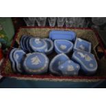 A Wicker Basket Containing a Collection of Blue and White Wedgwood Jasperware