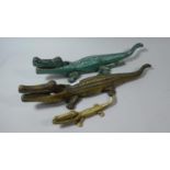 A Set of Three Graduated Crocodile Novelty Nut Crackers, Two Brass, One Painted, Longest 38cm