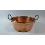 A Circular Copper Cooking Pot with Iron Ring Handles, 31cm Diameter