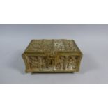 A Heavy Cast Brass Novelty Box in the Form of a Coffer Chest Decorated with Medieval Interior