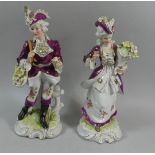 A Pair of Continental Figural Ornaments, Each 31cm High