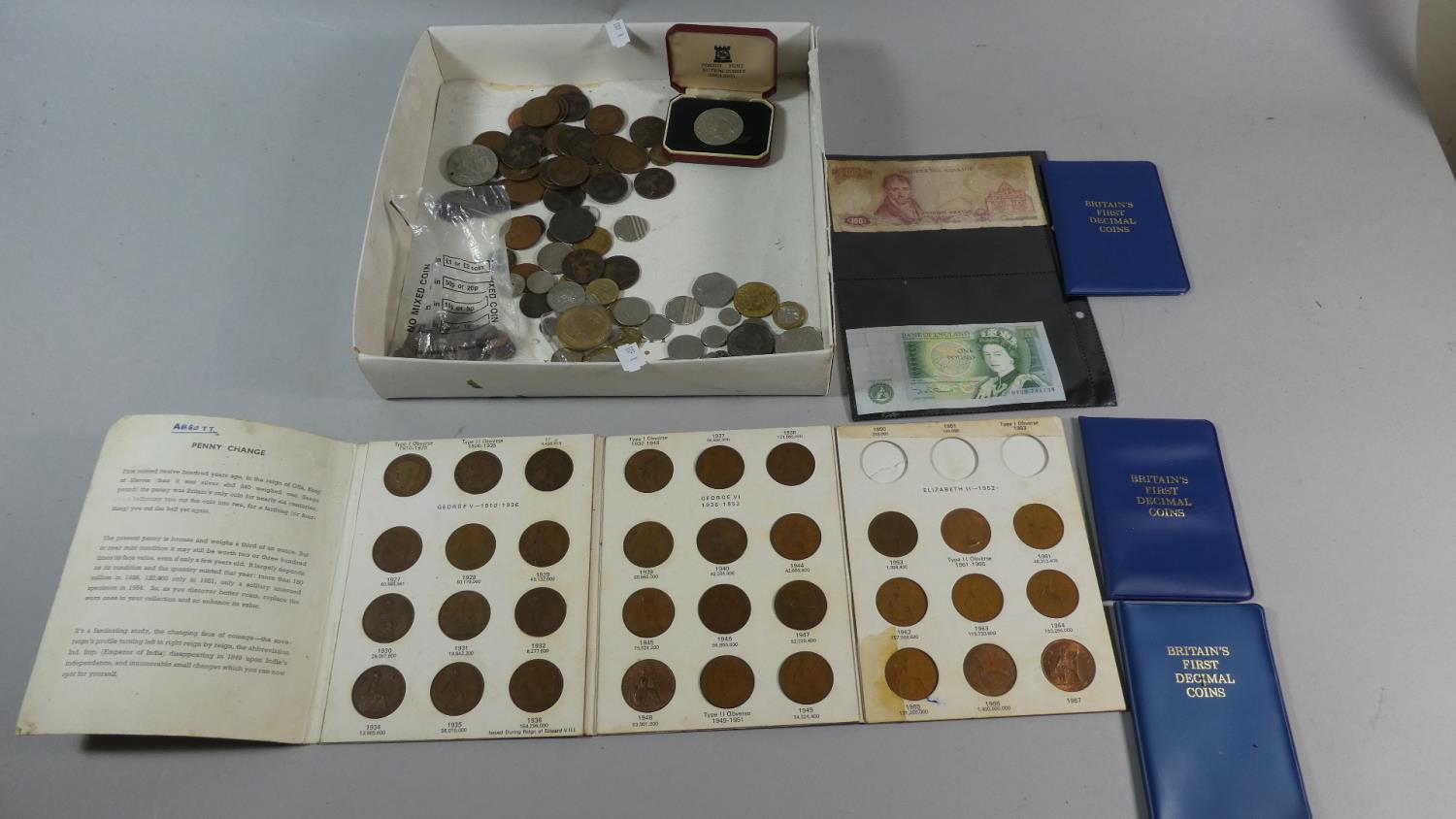 A Collection of Various Vintage Coins and Bank Notes