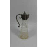 A Silver Plated Top Mask Head Glass Claret Jug, 29cm High