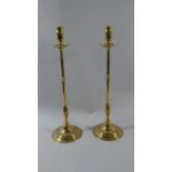 A Pair of Tall Brass Candle Sticks with Drip Trays, 42cm High