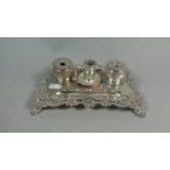 A Silver Plated Inkstand with Two Inkwells and Central Candle Stick, 21cm Wide