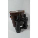 A Leather Cased Pair of 12x50 Stepsun Binoculars by Ross, London