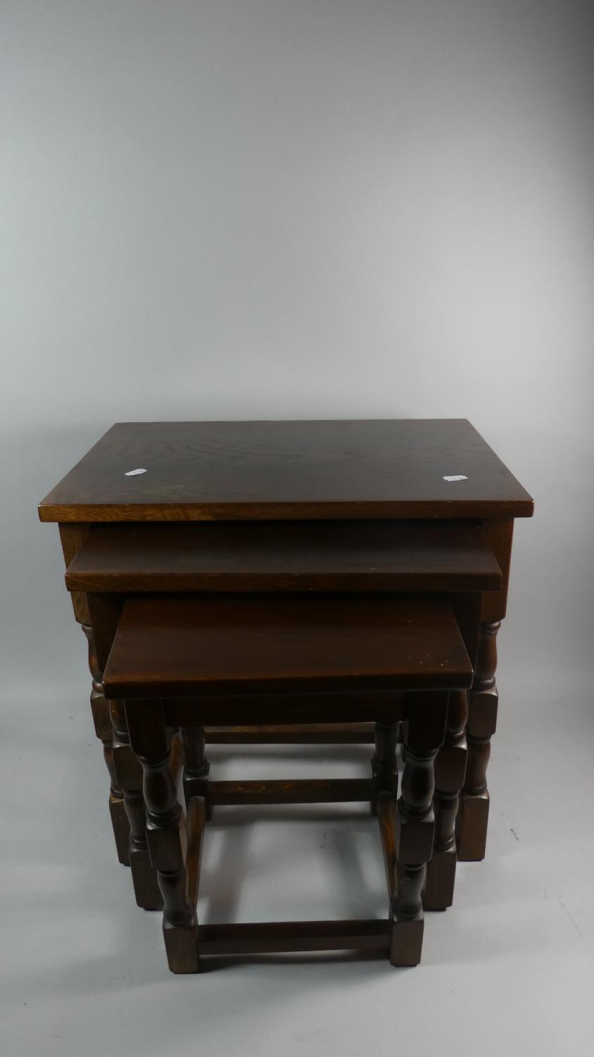 A Mid 20th Century Oak Nest of Three Tables the Largest 48cm Long