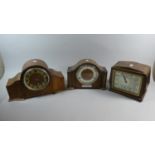 A Collection of Two Westminster Chime Mantle Clocks and an Art Deco Mantle Clock by Smiths, all In