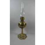 A Late 19th Century Brass Oil Lamp with Pierced Support and Reservoir Holder, Complete with Glass