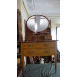 An Edwardian Inlaid Mahogany Dressing Chest with Two Long Drawers, Raised Jewel Drawers and Oval