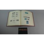 A Windsor Stamp Album Containing Victorian and Later British Stamps to Include 15 Penny Reds,