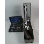 A Mid 20th Century Metal Cased Blood Pressure Machine and a Doctors Otoscope Set