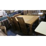 A 1980's Oak Dining Table and Set of Six Chairs