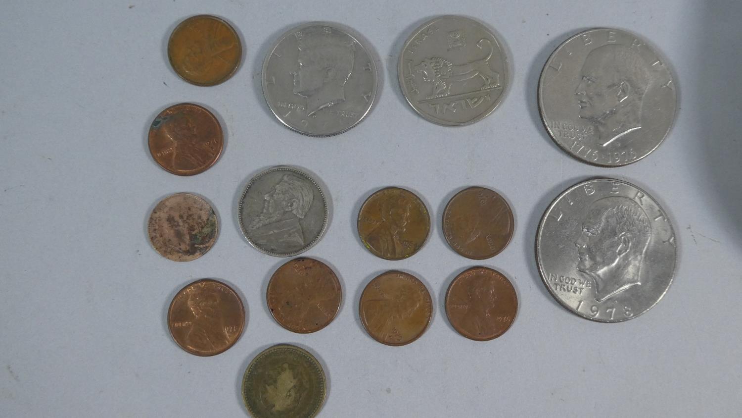 A Small Collection of Foreign and American Coins to Include Two American Dollars, Half Dollar, - Image 2 of 2