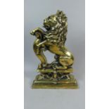 A Heavy Victorian Brass Door Porter in the Form of Rampant Lion on Stepped Plinth Base, 38cm High