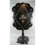A Victorian Mother of Pearl Inlaid Papier Mache Snap Top Table on Circular Scalloped Base with