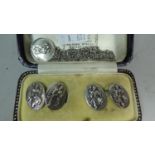 A Pair of St. Christopher Cufflinks and a Matching Pendant and Chain