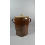 A Glazed Stoneware Two Handled Milk Crock with Wooden Lid, 35cm High