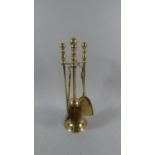 A Brass Fire Companion Set, 41cm Tall