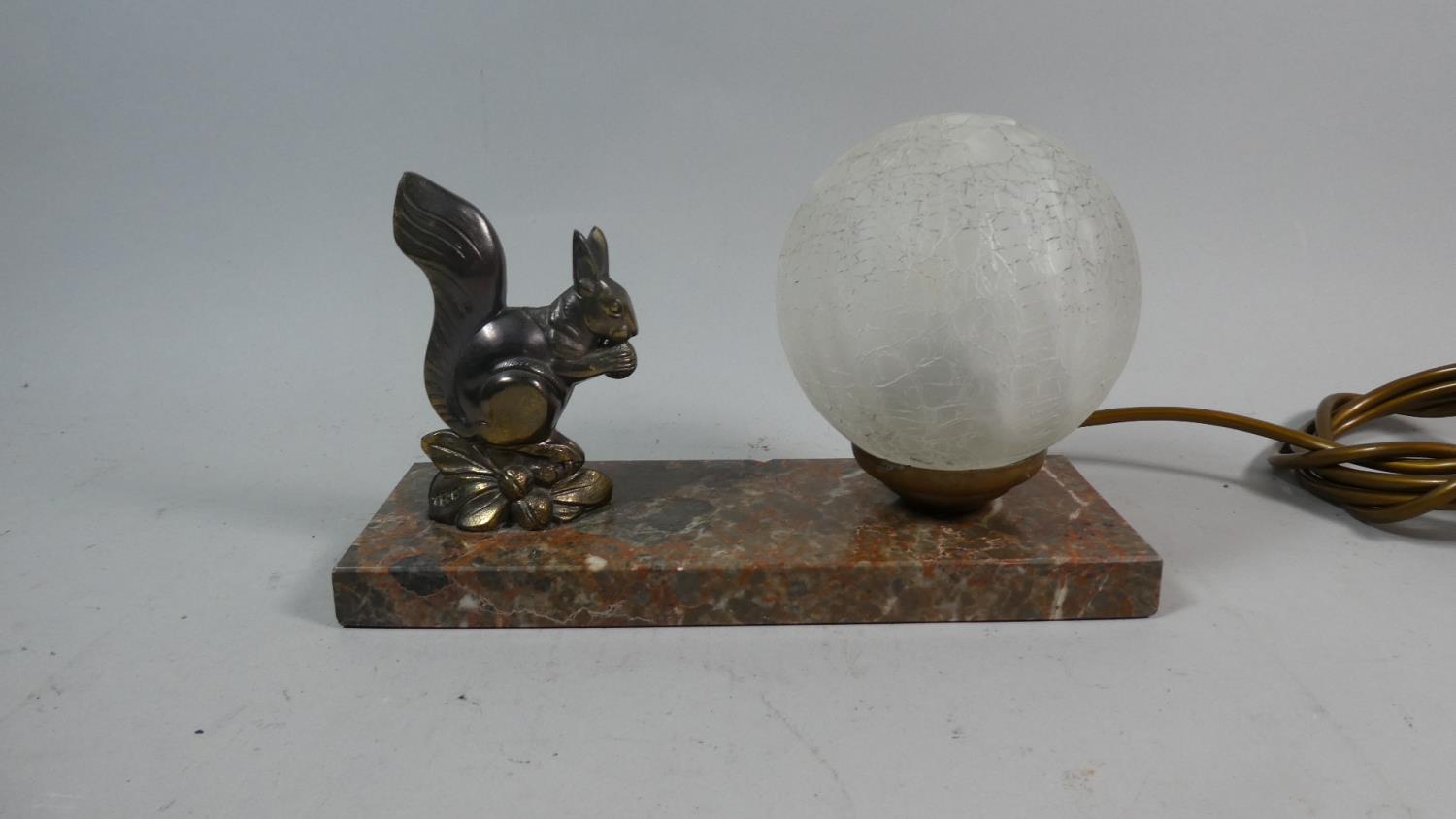 A French Novelty Night Light in the Form of a Squirrel Set on Rectangular Marble Plinth, 22cm Long