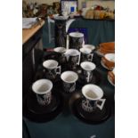 A Collection of Portmeirion Magic City Coffeewares to Include Six Trios Coffee Pot, Cream Jug and