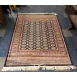 A Patterned Bokhara Silk Rug, 1.9m x 1.4m