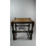 An Edwardian Oak Framed Cane Top Stool in Need of Attention, 44cm Wide