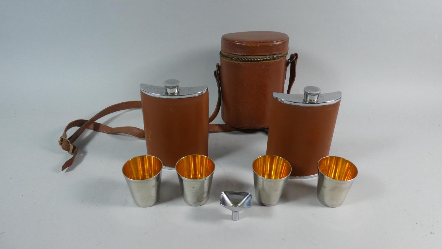 A Leather Cased Double Hip Flask and Silver Plated Shot Glass Set with Funnel, 15.5cm High