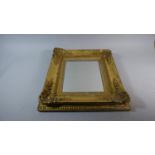 A Rectangular Gilt Wall Mirror, 53cm High