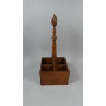 A Reproduction Burr Wood Four Bottle Carrier with Turned Carrying Handle, 47cm High