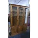 A Pine Glazed Display Cabinet with Cupboard Base, 132cm Wide