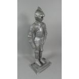 A Novelty Metal Door Stop in the Form of a Standing Knight, 57cm High