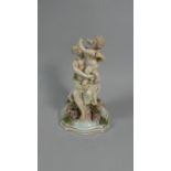 A Continental Porcelain Figural Group Depicting Mother and Child, AF 25cm high