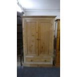 A Victorian Pine Double Wardrobe with Panelled Doors and Base Drawer, 128cm Wide