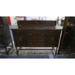 An Edwardian Oak Galleried Sideboard with Barley Twist Supports Having Two Long Drawers Above and